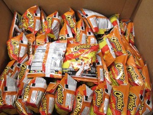 Box of Cheetos flamin hot 1 oz bags...