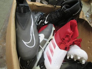 Box of new sports cleat shows witho...