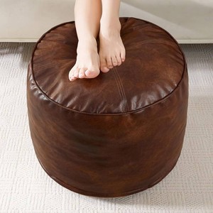 $60 HIGOGOGO Round Stuffed Pouf Ottoman, Pu Leather Poufs with Foam Chunk Filling, Furry and Fluffy Pouf Foot Stool Storage Ottoman, 26 X 18 Floor Poufs Foot Rest for Living Room,Dark Brown