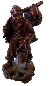 K - Carved Wooden Fisherman Statue