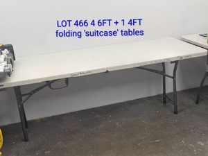 FOUR 6 FT AND ONE 4FT FOLDING SUITCASE TABLES