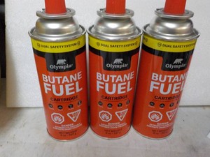 3 cans Olympia Butane Fuel...