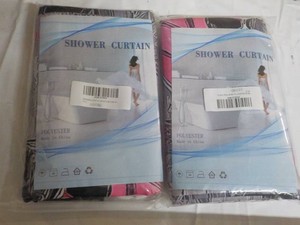 2 Shower Curtains and Rings...