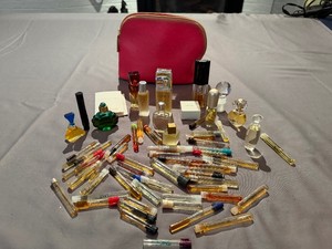 Vintage Designer Brands Perfumes and Sample Perfumes such as Calvin Klein, Gucci, Elizabeth Arden and more With Pink Estee Lauder Bag