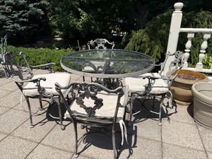 Round Wrought Iron Patio Table with Glass Top (42.5 x 30), Four Matching Wrought Iron Chairs and Four White Cushions