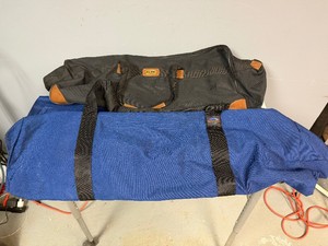 Extra Large Blue Canvas Bag  48 x 16 x 12 (rarely used) and Large Black Canvas Bag  27 x 12 x 13 (shows some wear)
