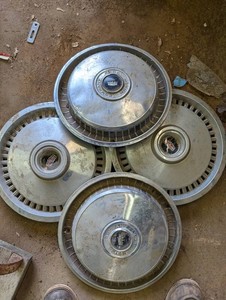 Vintage Ford Motor Company Hubcaps (Lot of 4)