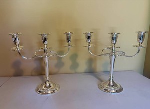 Two Silver-Toned Candelabras