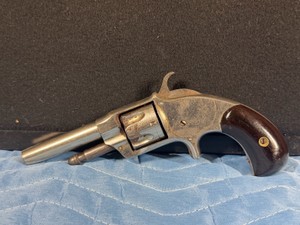 Otis A. Smith single-action .32 Cal, spur-trigger pocket revolver. The markings stamped into the top strap read Smiths Patent  Apr. 15, 1873 in fancy script - see description for more info - Permit & background check required