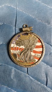American EagleWalking Liberty 1 ounce fine Silver Coin with American Flag background