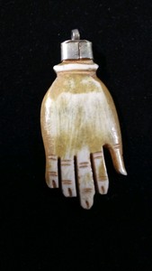 Vintage hand carved bone pendant