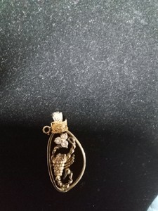 10 K gold chain with Sterling pendant and tester tested diamonds