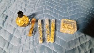 Containers of gold flakes