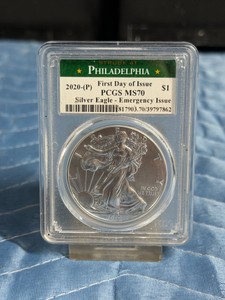 2020-(P) American Silver Eagle $1 coin, graded PCGS MS70 with a First Day of Issue label. This coin carries an Emergency Issue designation because it was struck at the Philadelphia Mint to meet a massive spike in silver demand during the COVID-19 pand
