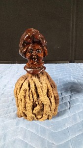 Signed Vintage folk art sculpture created by artist Shep Shapiro. Features a distinctive head carved from a lacquered apple and attached to a body made of burl wood