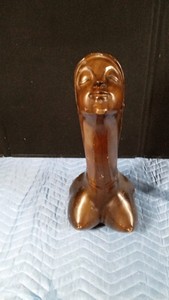 Vintage Mabina-style figural sculpture from the phillipines, likely hand- carved from monkey pod wood during the 1970s