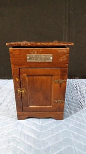 Small toy or display ice box refrigerator with Mitchell &amp Lewis Co, Ltd emblem on front