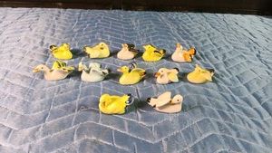 12 miniature ceramic ducks