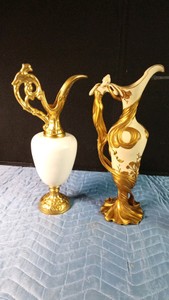 Veronese design art Noveau style vase featuring a cold-casr resin & bronze powder construction with hand-painted maid figure and a resemblance of a vintage Arnels porcelain body paired with ornate gol-gilt metal or painted accents .