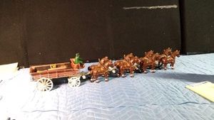 Cast iron Clydesdale-drawn ber wagon