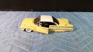 Jada Toys diecast model of a Chevrolet Impala from the showroom Floor series