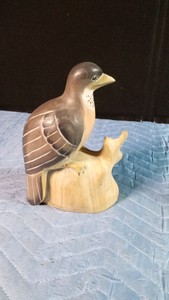 signed wood carving of a bird by artist Charles Vigodan