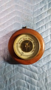 Vintage ATCO aneroid barometer produced in Germany (a brass face with a circular wooden case)