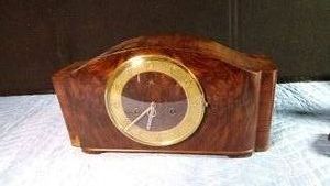 1930s-1950s Mantel clock which appears to be a German Mautheclock with walnut veneer and a brass dial