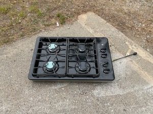 General Electric gas cooktop stove model number JGP329DET1BB.