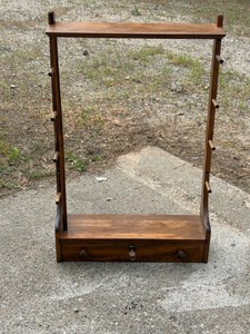 vintage wooden wall-mount gun rack
