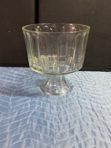 vintage, clear glass trifle bowl featuring a ribbed or panelled design.