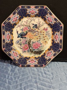 vintage Japanese octagonal decorative porcelain plate featuring a traditional peacock and peony motif