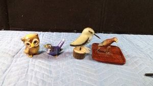 1 metal, 2 ceramic and 1 wooden birds