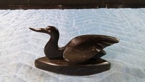 Vintage miniature sculpture of a swan crafted from carved horn