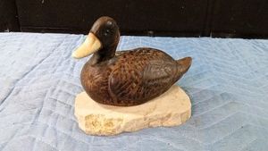 Signed crafted textured ceramic stoneware duck on slap of granite by Artist Maigonis Maigon Daga