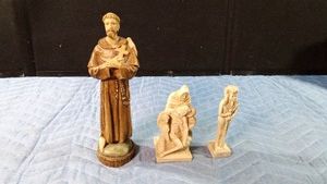 Vintage figurine of St. Francis of Assisi surrounded by birds resin and 2 other resin figurines
