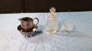 Hoffman perfume bottle from Czechoslovakia, shot glass and a Reed & Barton Paul Revere miniature silver plated pitcher and bowl