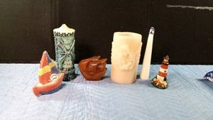 5 unique collectible candles and 1 battery operated one.