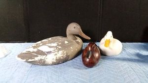 Styrofoam duck decoy with plastic head, P. Dupont cast ceramic wood looking duck and a ceramic duck bookend