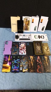 15 phone cases, 5G Moto phone and a smart watch with 2 bands