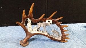 Resin moose antle with carving scene of moose in the wild