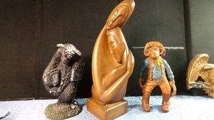 1965 signed couple embracing sculpture by Artist Brower at Marwel industry Inc., plaster monkey statue and a resin garden bear