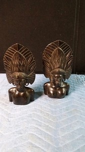 Vintage Ballinese hand-carved wooden bust sculptures of a man and a woman