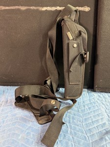Uncle Mikes Sidekick nylon vertical shoulder holster, commonly designed to fit revolvers with long barrels.
