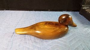 Signed wooden duck decor by John Bundy known for using hardwoods with intense grains and glass eyes