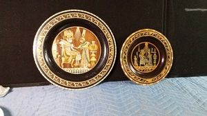 Vintage handmade Egyptian wood decorative plates featuring intricate mother of pearl, copper, and steel inlay
