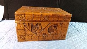 Vintage carved wood chest manufactured in Macau during the period it was under Portuguese administration and before the territory was handed over to China in 1999