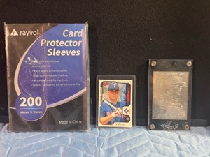 Ken Griffey Jr. Limited Edition Silver Baseball Card (SN#022247), Mark Teixeira Texas Rangers 2002 Rookie Card and 200 Plastic Card Protector Sleeves