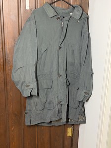 London Fog mens microfiber jacket features a hood, front buttons, and flap pockets
