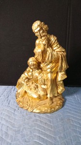 Golden holy family figurine